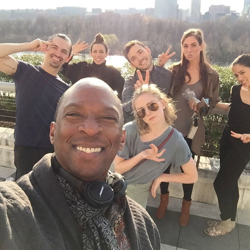 Boris Willis with the Company E ensemble outdoors by the river