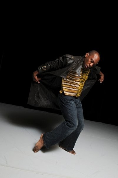 Boris Willis leaning into a deep lunge, jacket opening