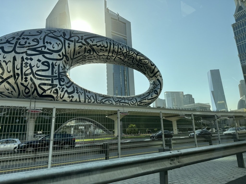 The Museum of the Future in Dubai, its torus form covered in Arabic calligraphy